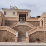 Explore this neoclassical architecture in Kalamata, Greece featuring stone and stucco design.
